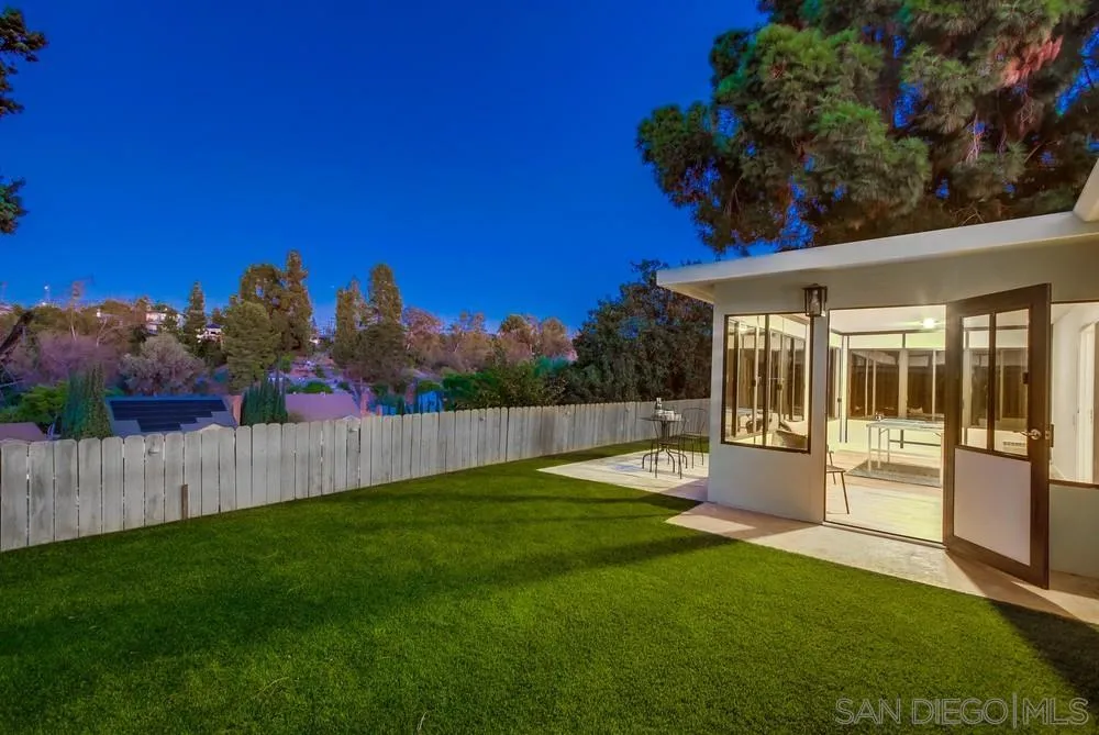 4793 54th Street San Diego, CA 92115 - Photo 6 of 74 a view of a house with backyard and porch