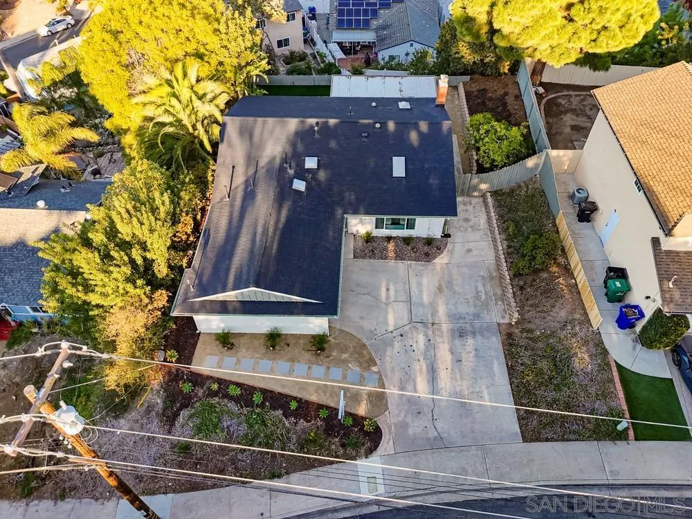 4793 54th Street San Diego, CA 92115 - Photo 68 of 74 an aerial view of a house with a swimming pool