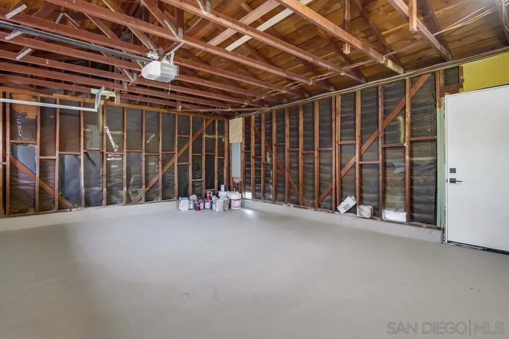 4793 54th Street San Diego, CA 92115 - Photo 73 of 74 a view of an empty room with wooden walls