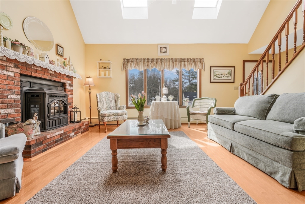 7 Bow Drive Acushnet, MA 02743 - Photo 11 of 42 a living room with furniture and a fireplace