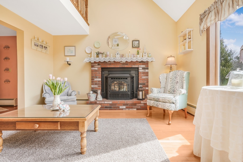 7 Bow Drive Acushnet, MA 02743 - Photo 14 of 42 a living room with furniture and a fireplace