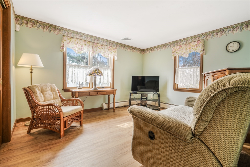 7 Bow Drive Acushnet, MA 02743 - Photo 15 of 42 a living room with furniture and a flat screen tv