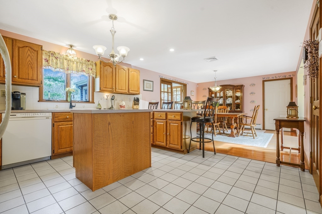 7 Bow Drive Acushnet, MA 02743 - Photo 20 of 42 a kitchen with stainless steel appliances granite countertop a refrigerator and a sink
