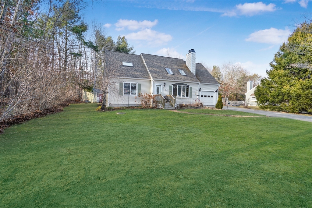7 Bow Drive Acushnet, MA 02743 - Photo 3 of 42 a big house with a big yard and large trees