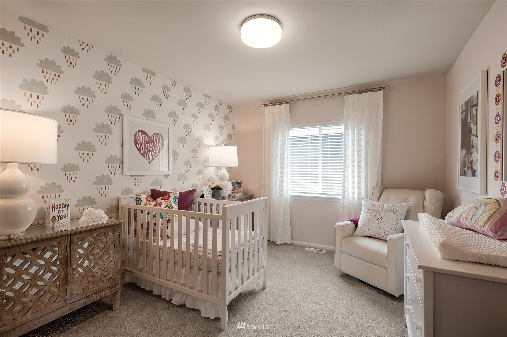 4028 234th Place Southeast, Unit 64 Bothell, WA 98021 - Photo 15 of 19 a bedroom with a bed and a window