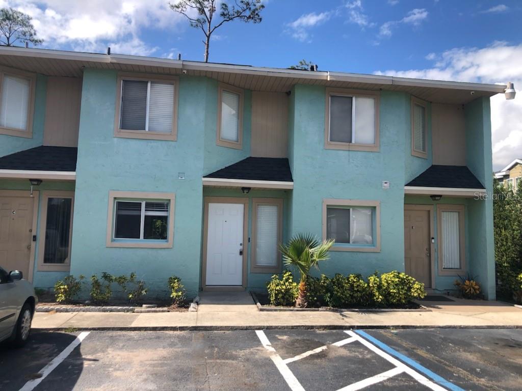 283 Gardner Lane, Unit D Kissimmee, FL 34743 - Photo 1 of 12 a front view of a house
