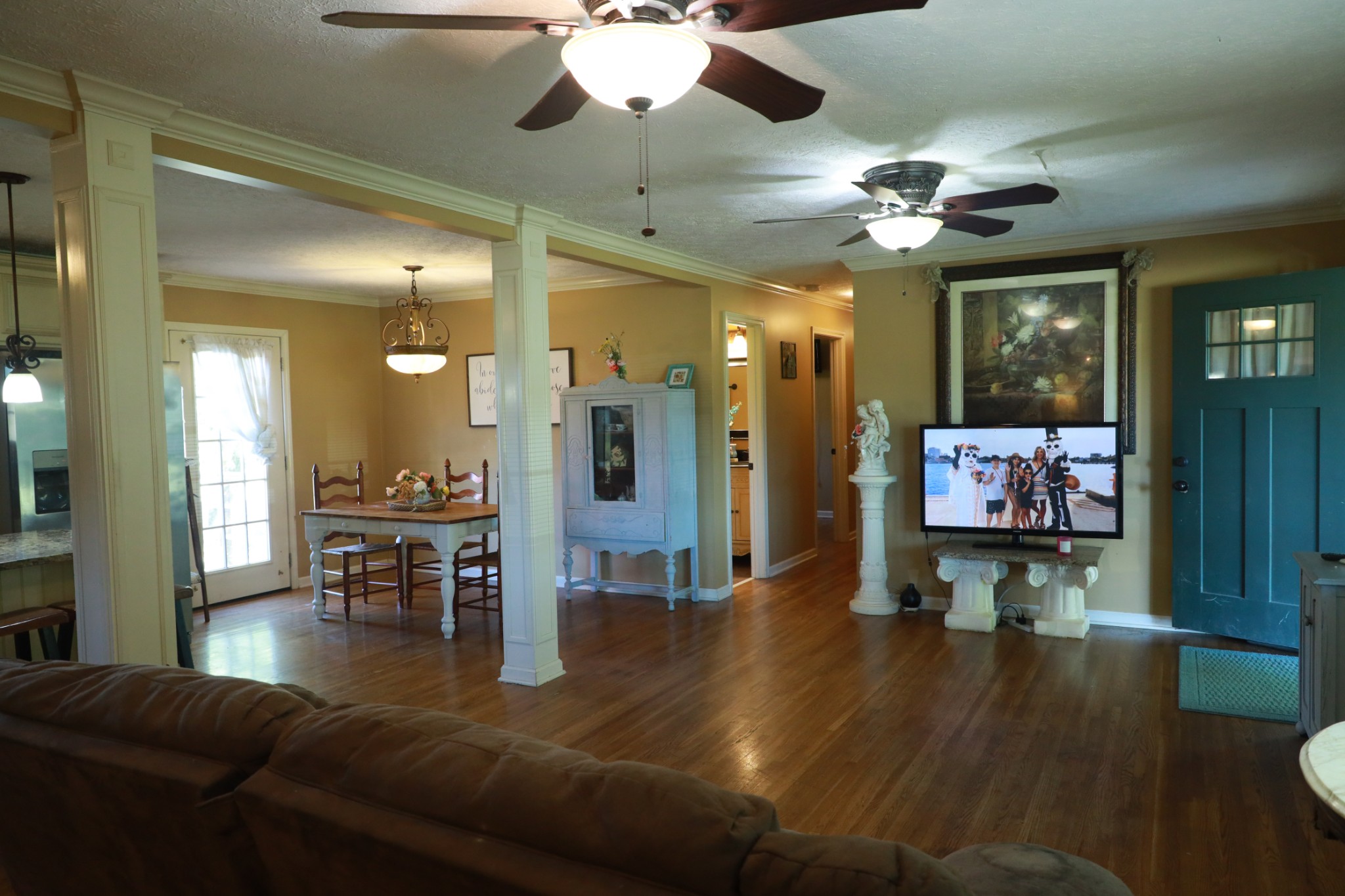 12354 Owens Chapel Road Springfield, TN 37172 - Photo 11 of 51 a living room with furniture and a chandelier