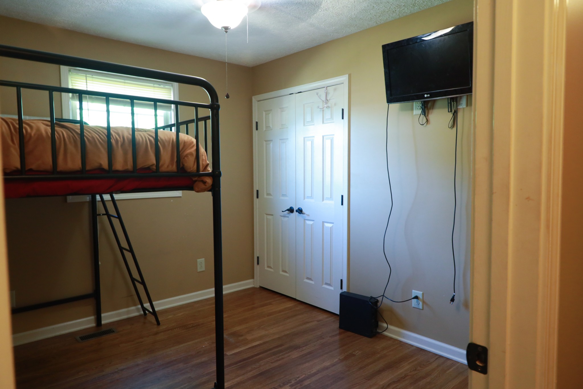 12354 Owens Chapel Road Springfield, TN 37172 - Photo 27 of 51 a view of a room with wooden floor and windows