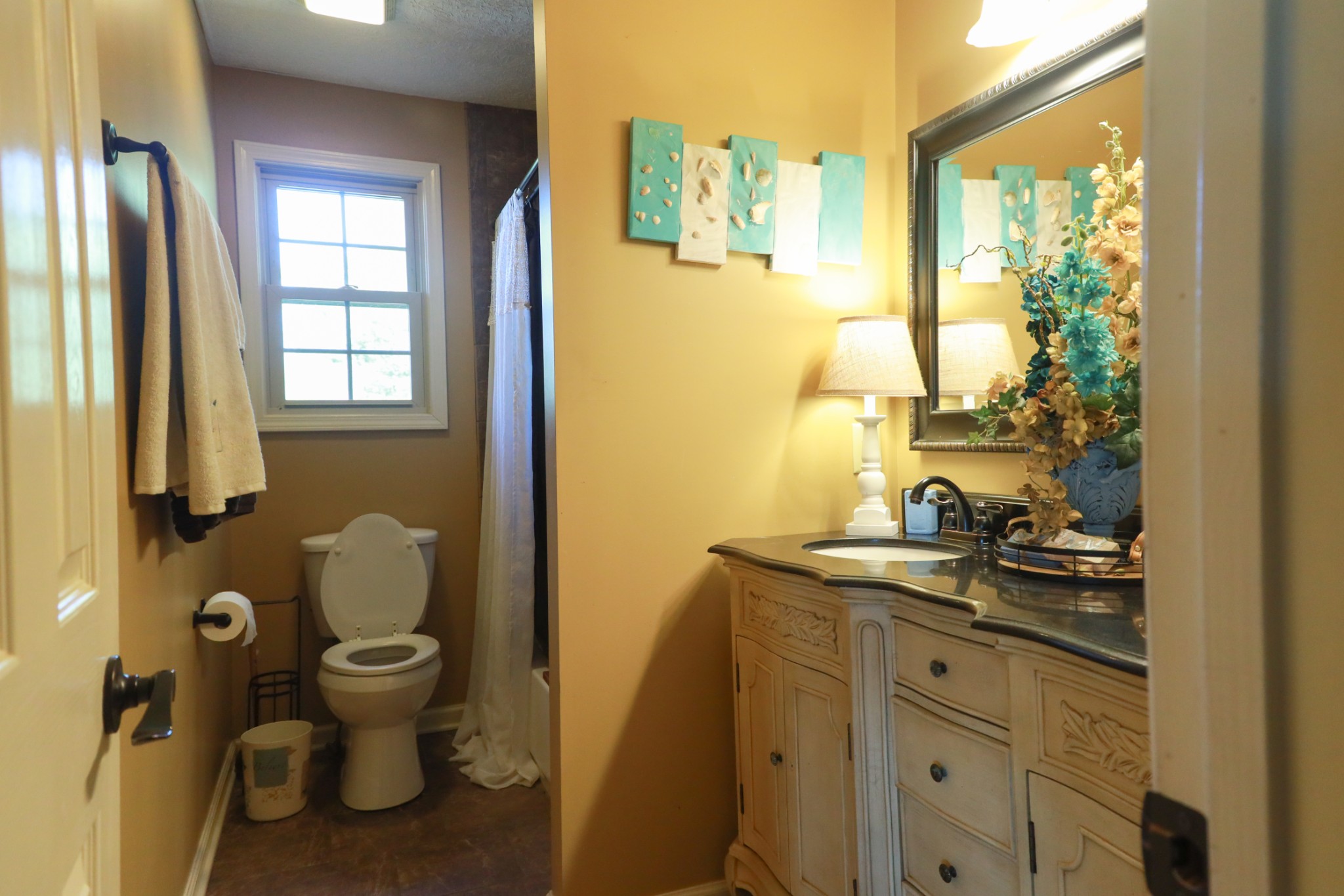 12354 Owens Chapel Road Springfield, TN 37172 - Photo 29 of 51 a bathroom with a sink and a toilet