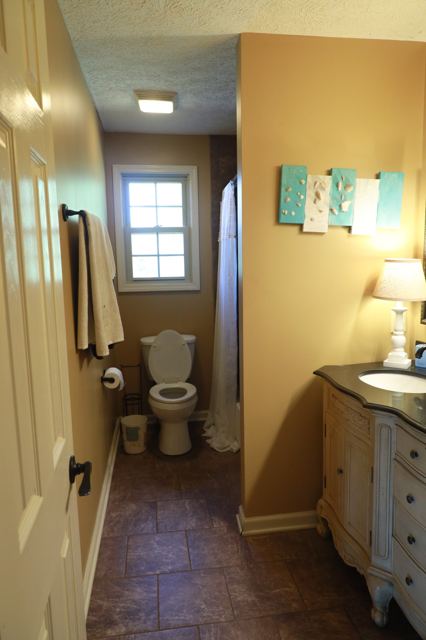 12354 Owens Chapel Road Springfield, TN 37172 - Photo 30 of 51 a bathroom with a toilet sink and mirror