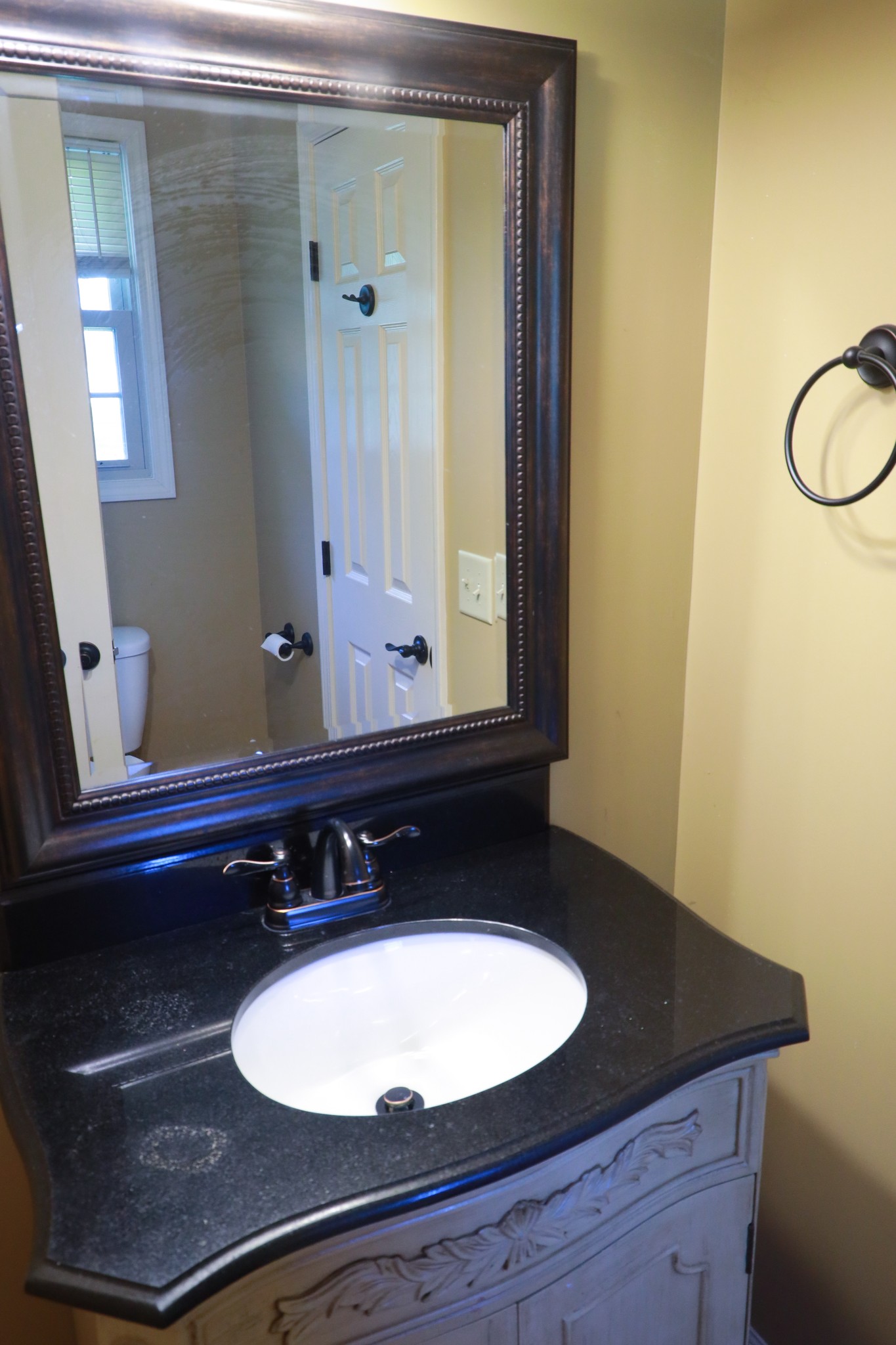 12354 Owens Chapel Road Springfield, TN 37172 - Photo 35 of 51 a bathroom with a sink and a mirror