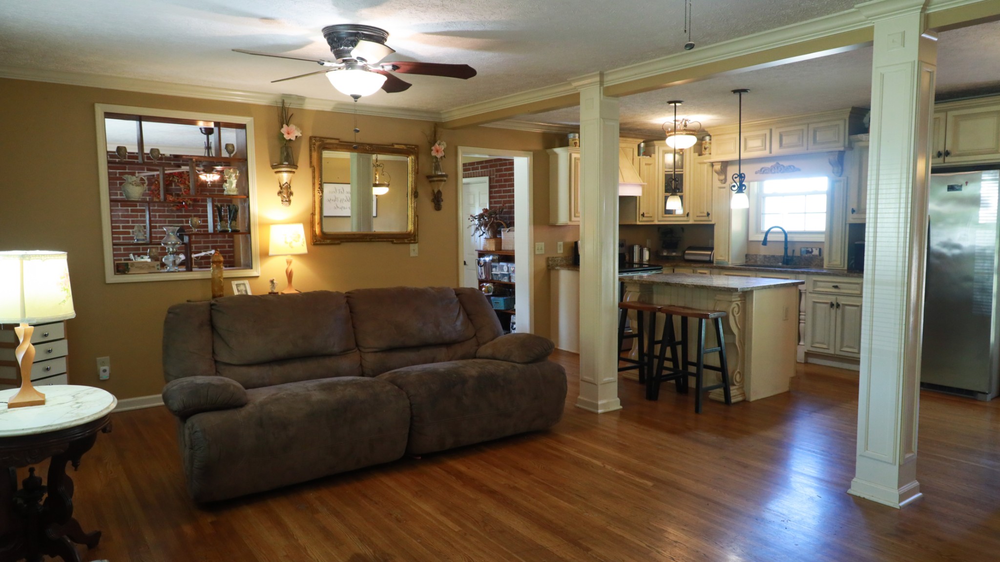 12354 Owens Chapel Road Springfield, TN 37172 - Photo 9 of 51 a living room with furniture and a wooden floor