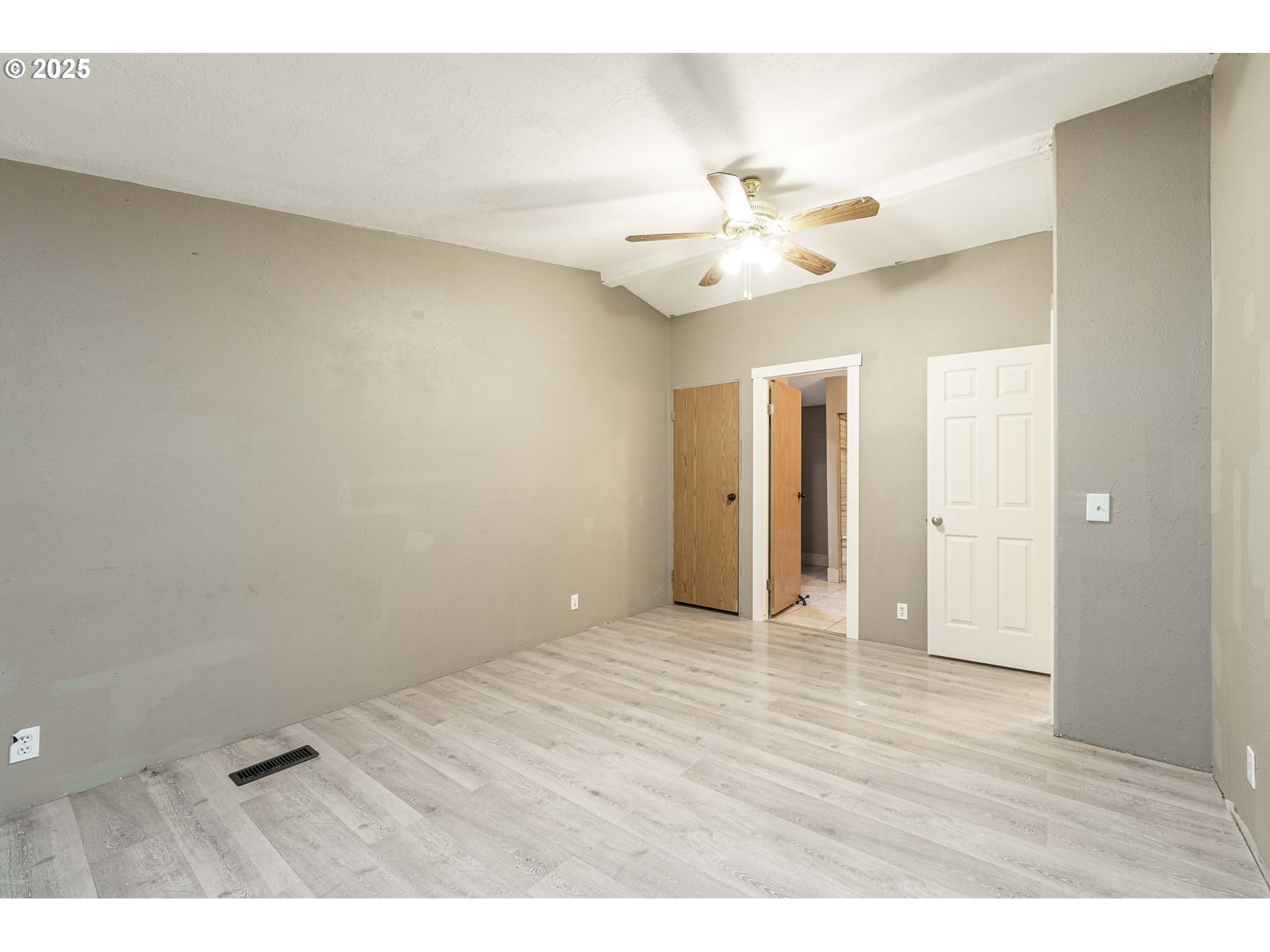 3777 Addy Street, Unit 17 Washougal, WA 98671 - Photo 13 of 25 a view of an empty room and chandelier fan