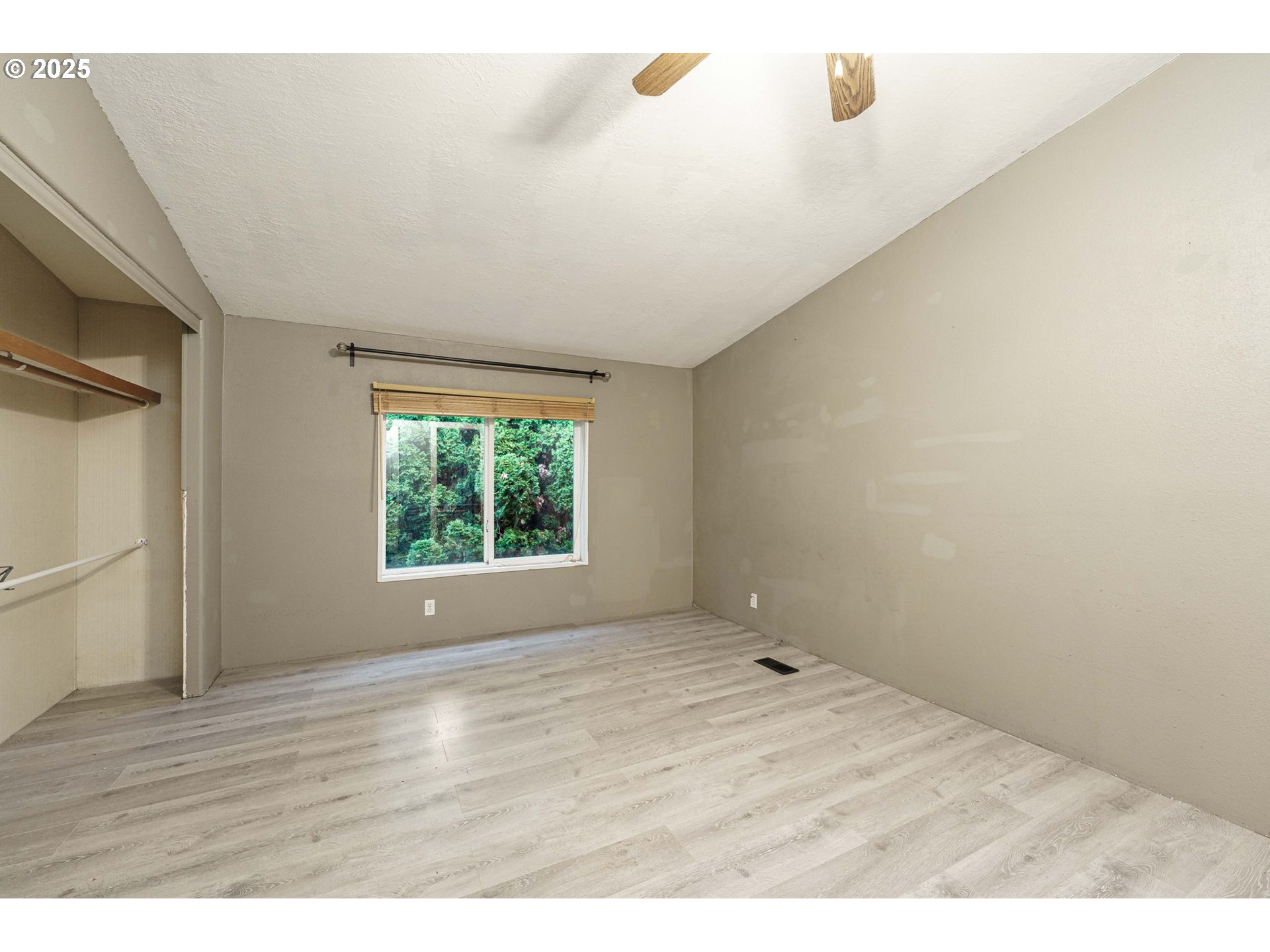 3777 Addy Street, Unit 17 Washougal, WA 98671 - Photo 15 of 25 a view of empty room with wooden floor and fan