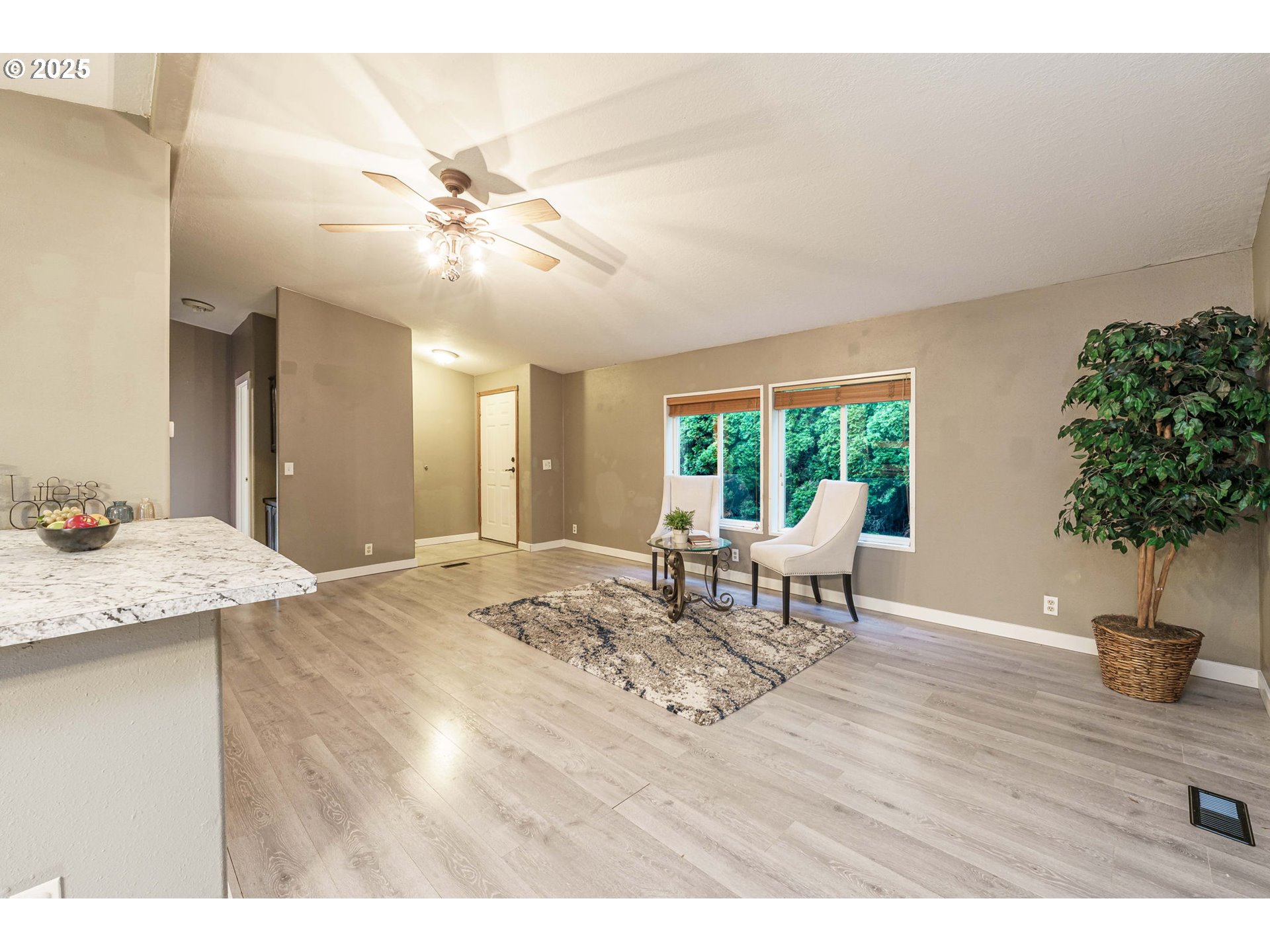 3777 Addy Street, Unit 17 Washougal, WA 98671 - Photo 4 of 25 a living room with furniture and a large window