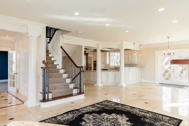 434 Cardon Ridge Drive Smithfield, UT 84335 - Photo 2 of 59 Entrance foyer with decorative columns, crown molding, french doors, and suspended lighting