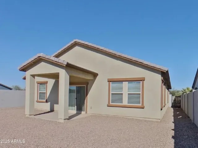 a bathroom with a bathtub and a toilet
