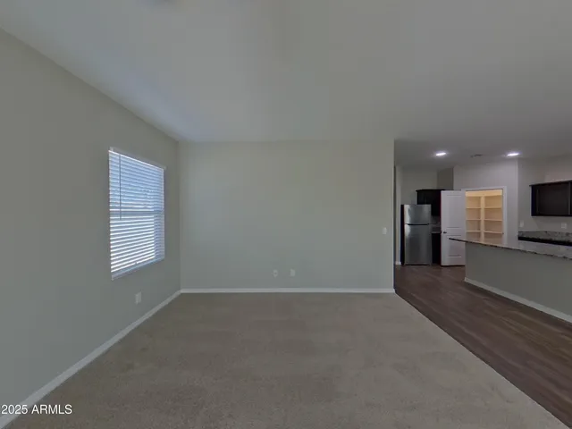 a picture of a bench in front of a window