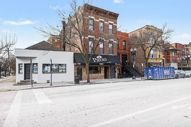 a view of a building with a street