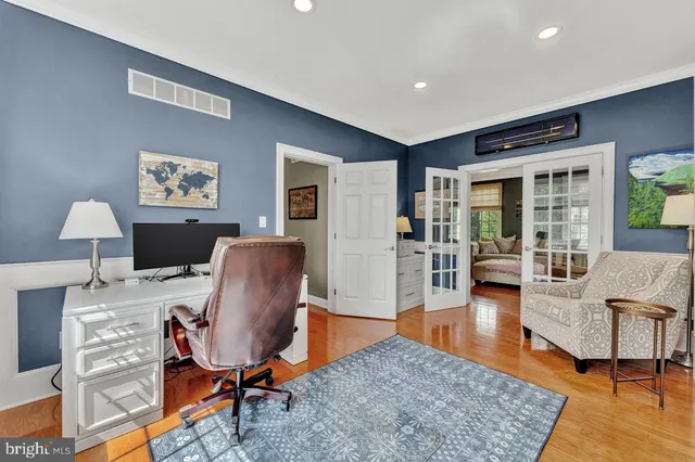 a living room with furniture fireplace and a flat screen tv