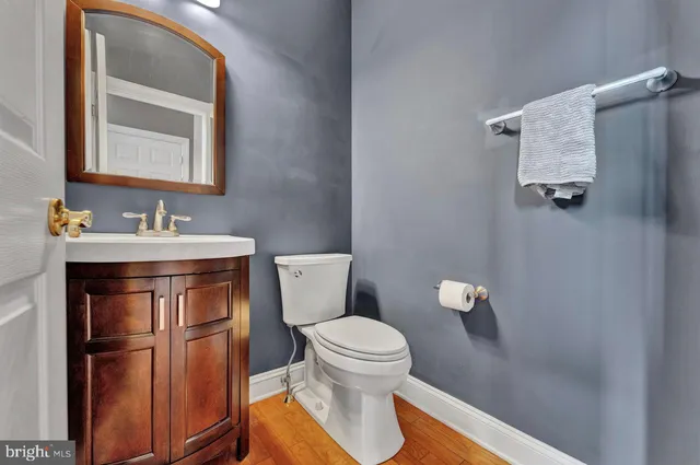 a spacious bedroom with a bed and a cabinets