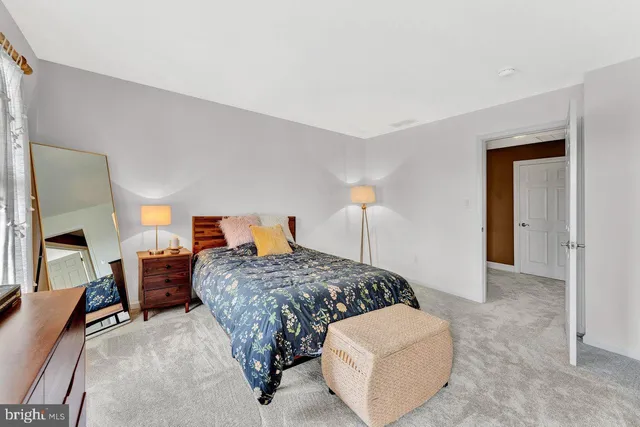 a living room with fireplace and a flat screen tv