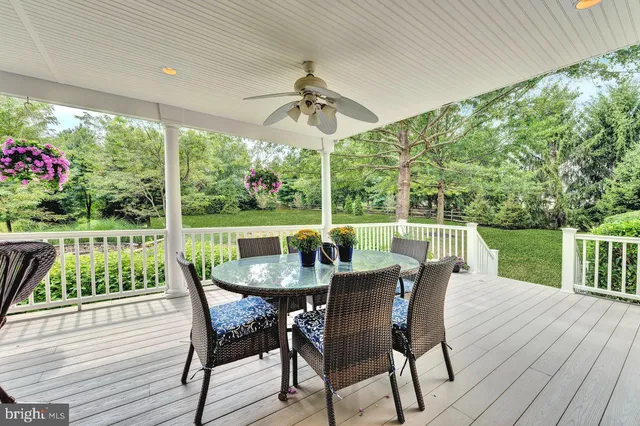 a view of a brick house with a small yard