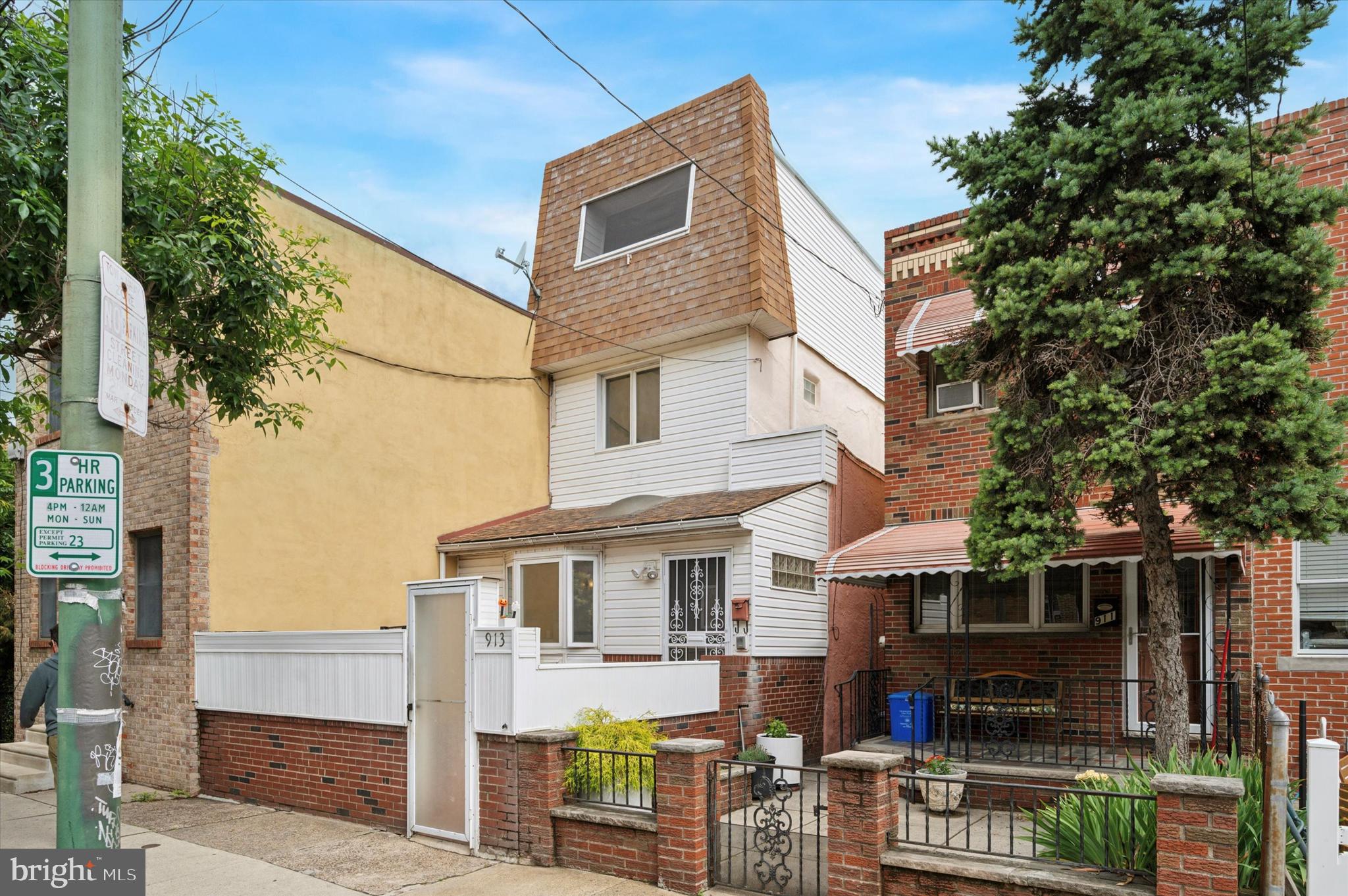 913 Tasker Street Philadelphia, PA 19148 - Photo 1 of 22 a front view of a house with balcony