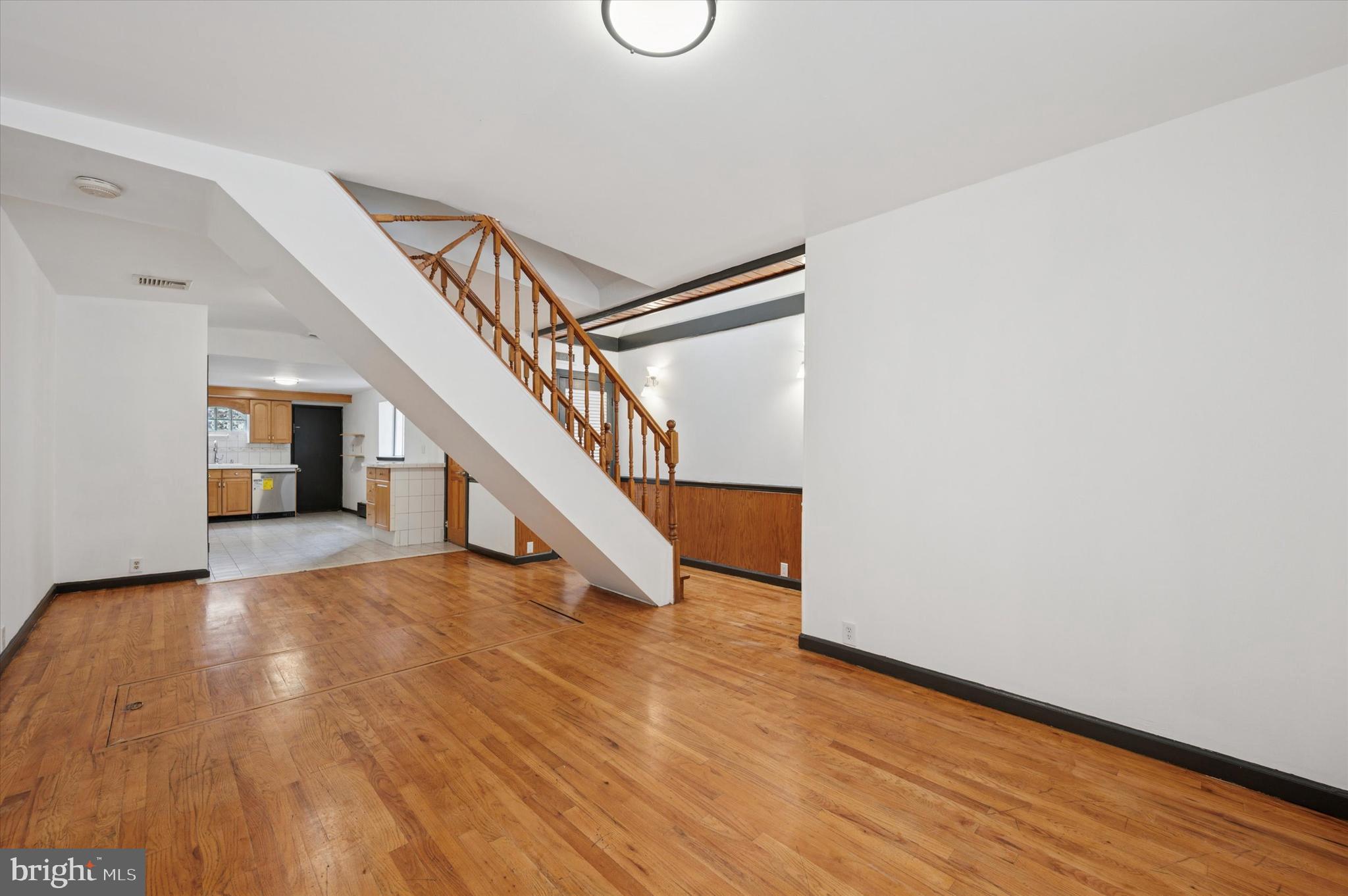 913 Tasker Street Philadelphia, PA 19148 - Photo 2 of 22 a view of entryway and hall with wooden floor