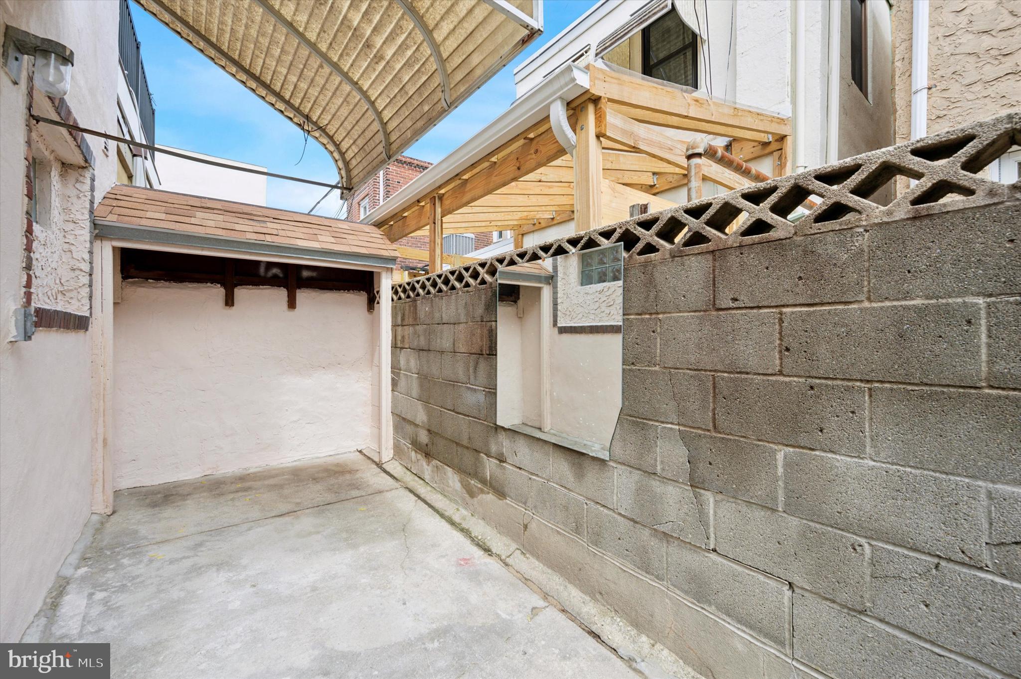 913 Tasker Street Philadelphia, PA 19148 - Photo 9 of 22 a view of a garage with rack
