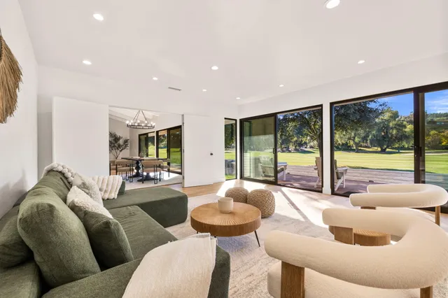 a bedroom with a bed and a potted plant