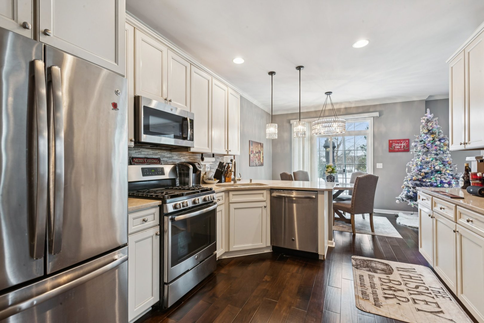171 Birch Lane St. Charles, IL 60175 - Photo 11 of 31 a kitchen with a sink stainless steel appliances and white cabinets