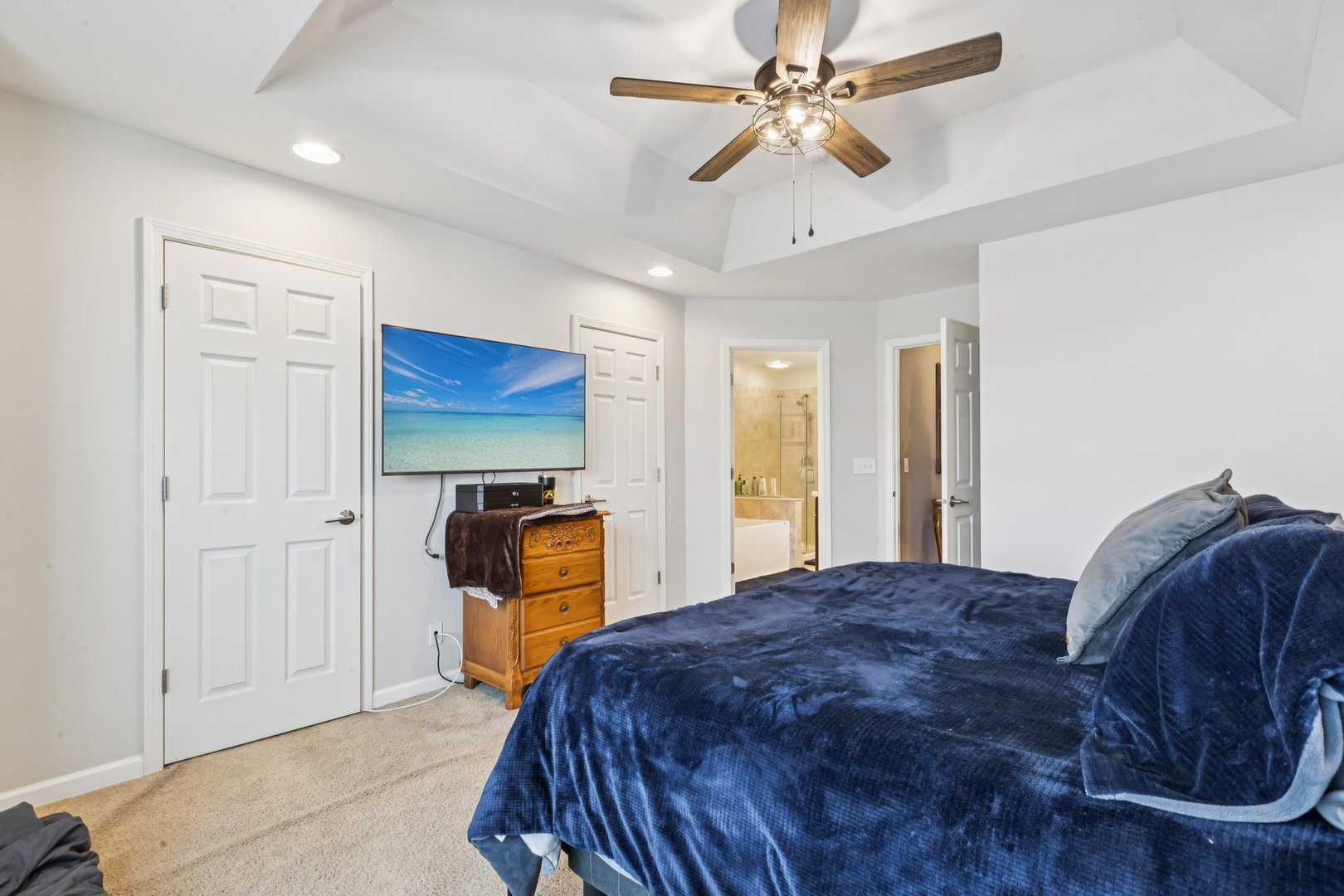 171 Birch Lane St. Charles, IL 60175 - Photo 16 of 31 a bedroom with a bed and a chandelier