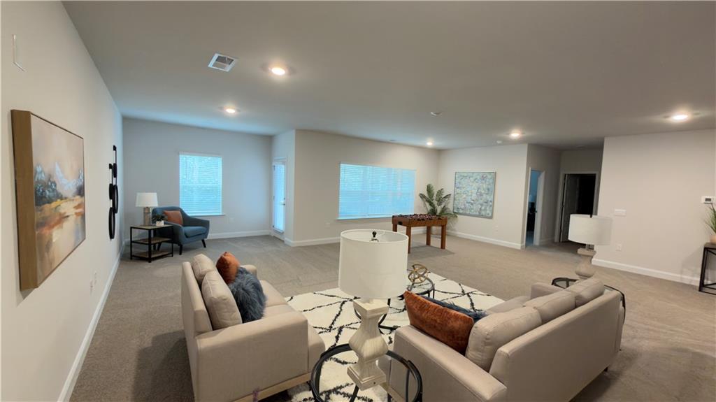 620 Bald Ridge Circle Demorest, GA 30535 - Photo 29 of 43 a living room with furniture and a flat screen tv