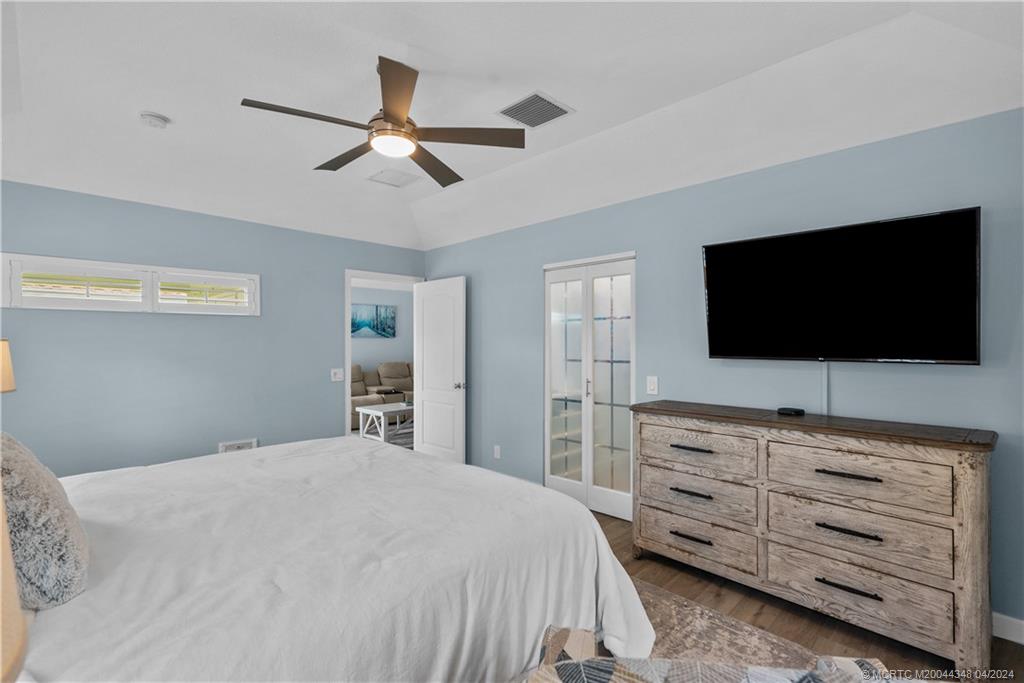 2733 Southwest Regency Road Stuart, FL 34997 - Photo 19 of 45 Primary Bedroom
