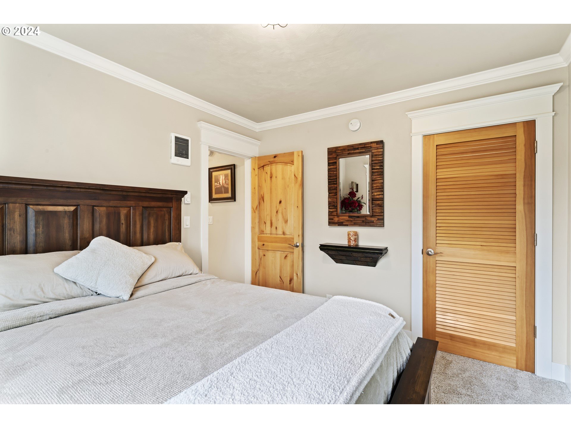 599 River Loop 2 Eugene, OR 97404 - Photo 16 of 25 a bedroom with a large bed and wooden floor