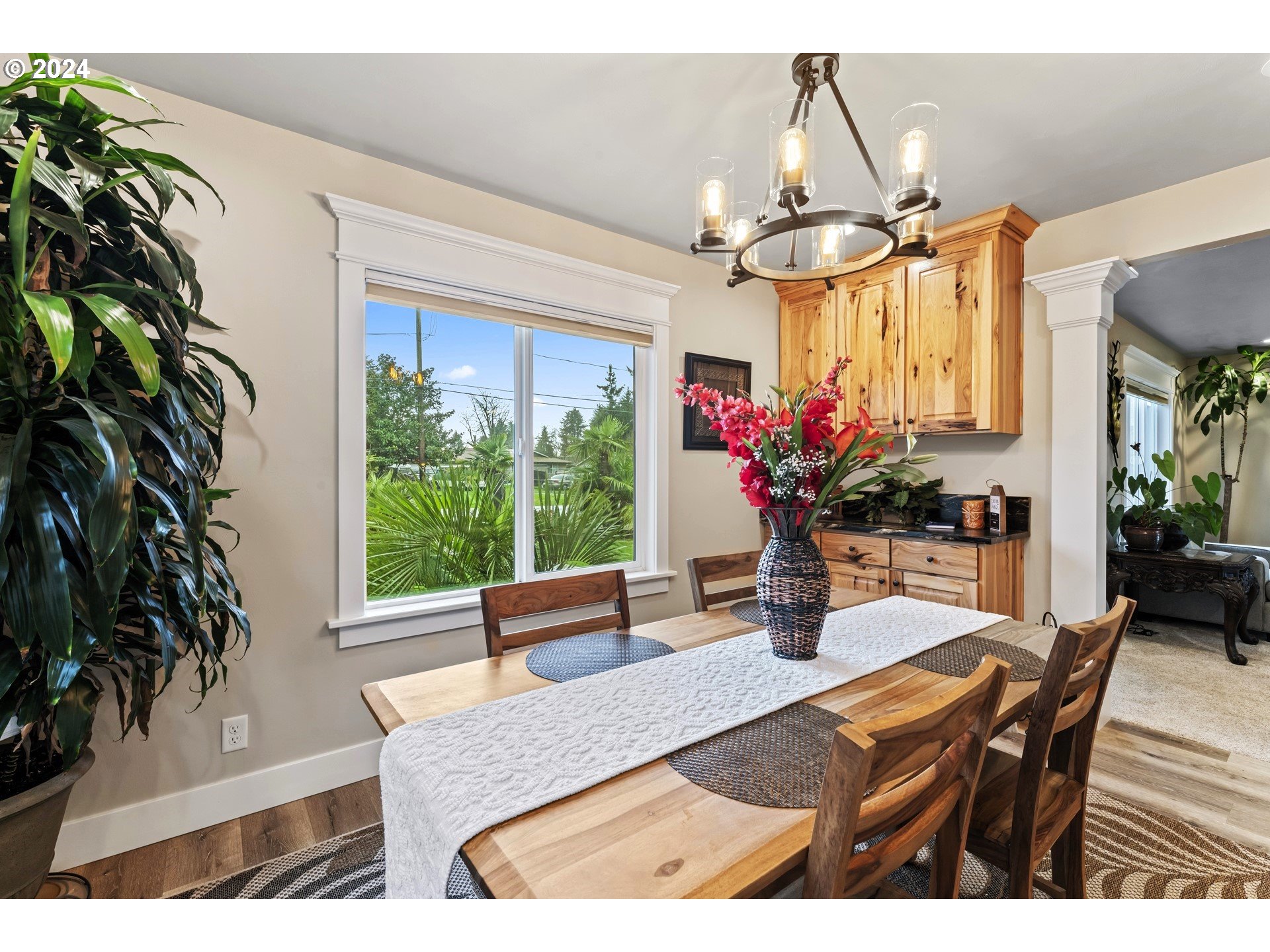 599 River Loop 2 Eugene, OR 97404 - Photo 8 of 25 a dining room with wooden floor table and chairs