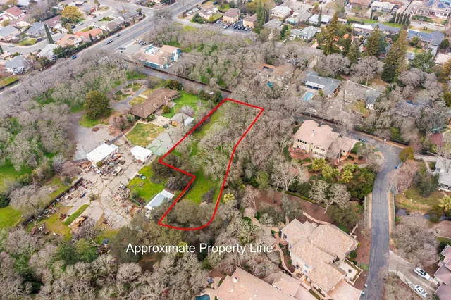 a view of a street with a building in the background