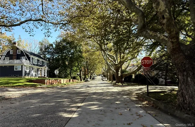 a view of road with trees