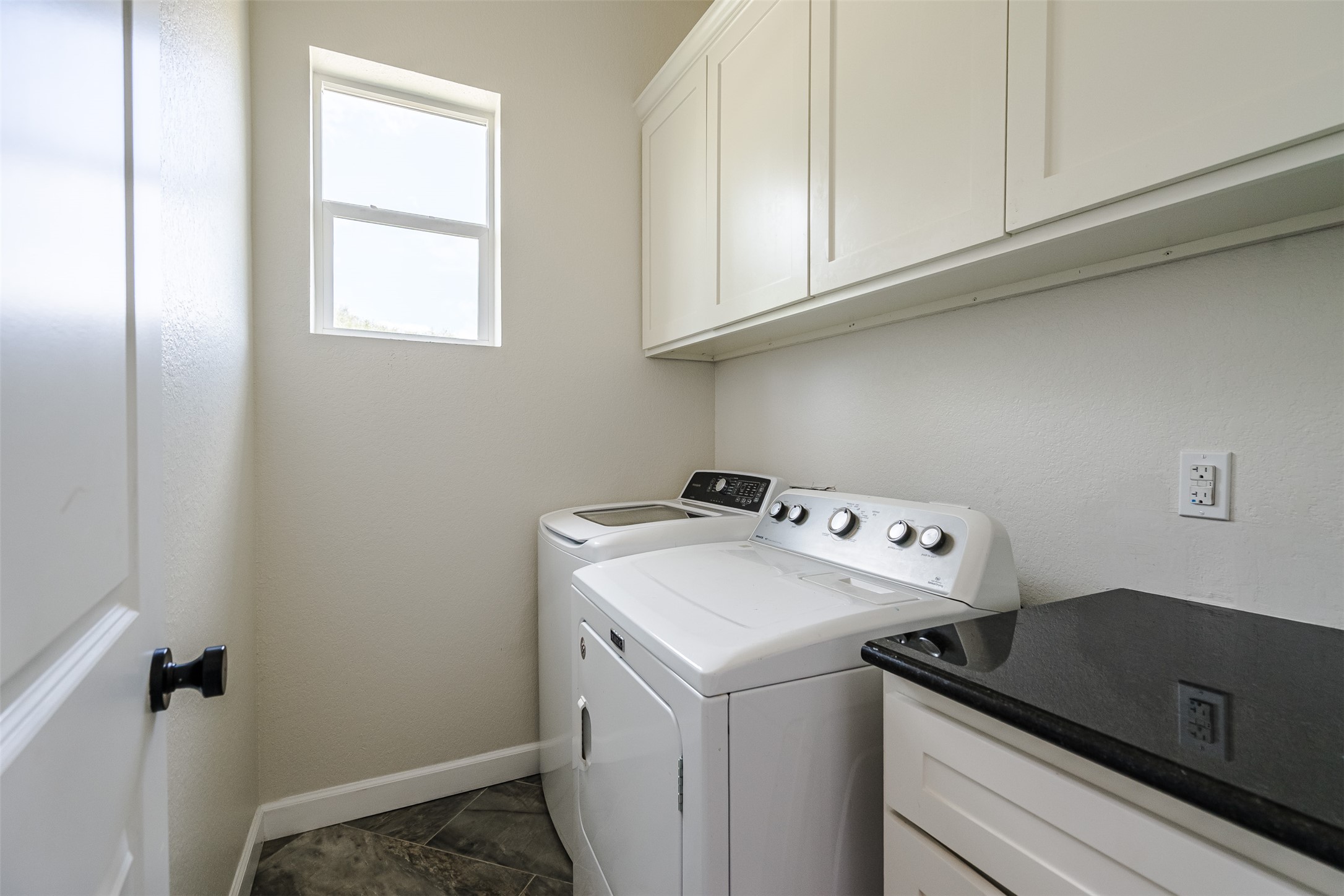 1354 Old Pin Oak Road Paige, TX 78659 - Photo 16 of 37 a utility room with dryer and washer