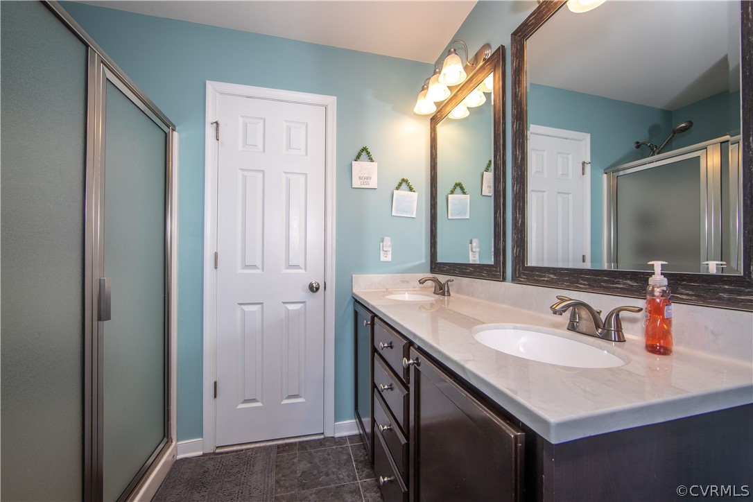3121 Barnack Road Midlothian, VA 23112 - Photo 19 of 31 Double sinks promote harmony in the primary bathro