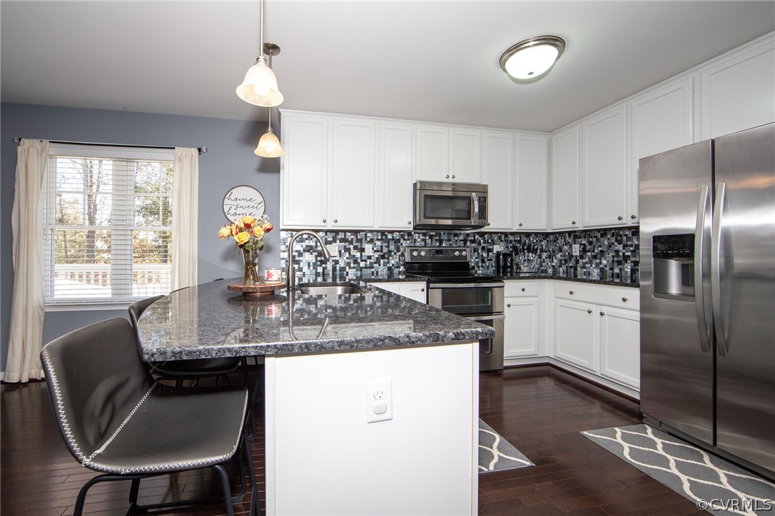 3121 Barnack Road Midlothian, VA 23112 - Photo 9 of 31 Kitchen has granite countertops, tile backsplash,