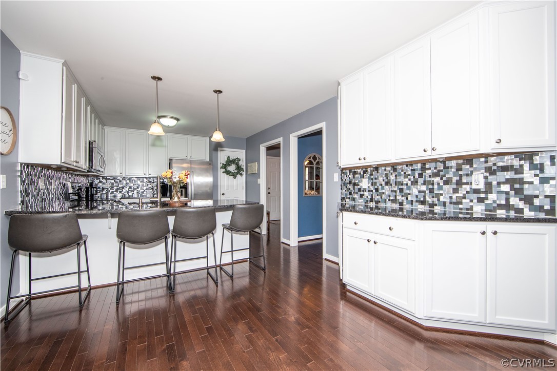 3121 Barnack Road Midlothian, VA 23112 - Photo 10 of 31 Tons of cabinet space, and the dining area is just