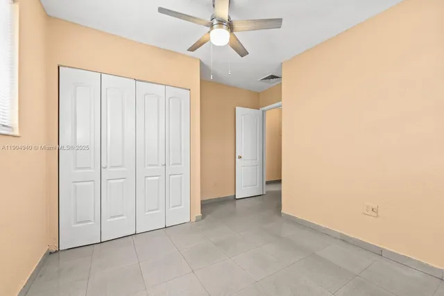 a bathroom with a sink toilet and a mirror