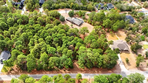 a view of a house with a tree