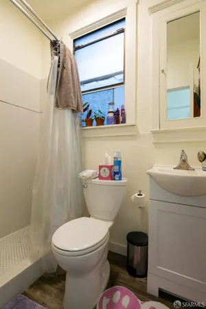 a bathroom with a toilet and a sink