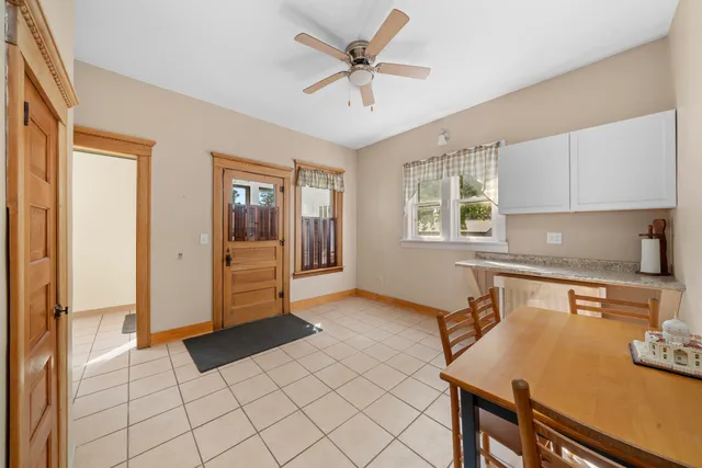 a view of an empty room with a fireplace