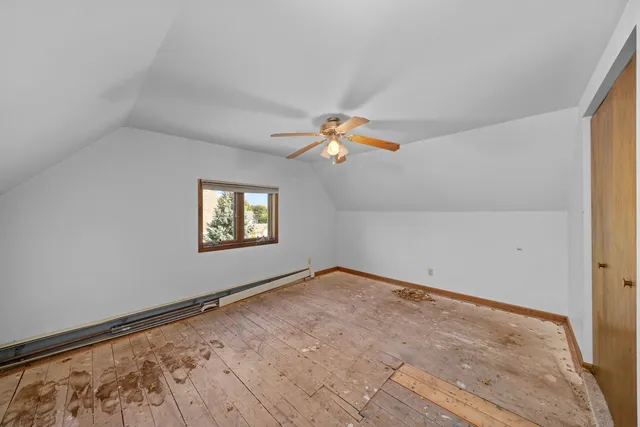 a view of a balcony with wooden floor