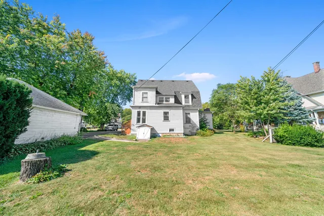 a house with trees in the background