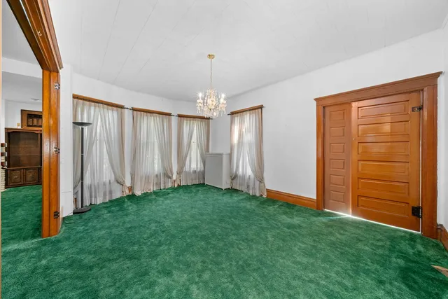 a view of a porch with a yard